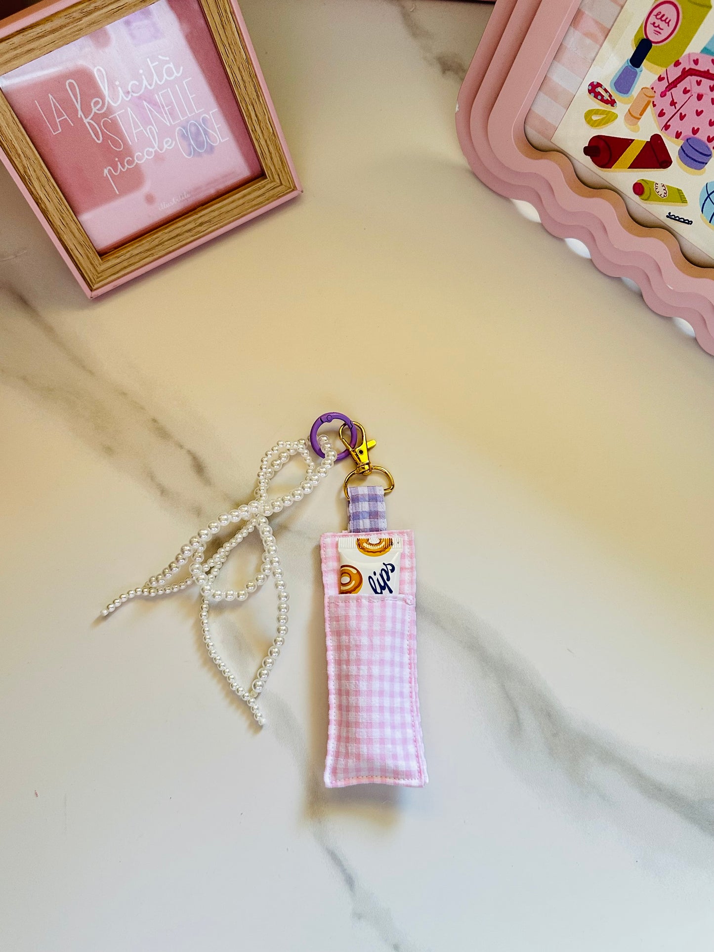 Porta lipbalm con charm