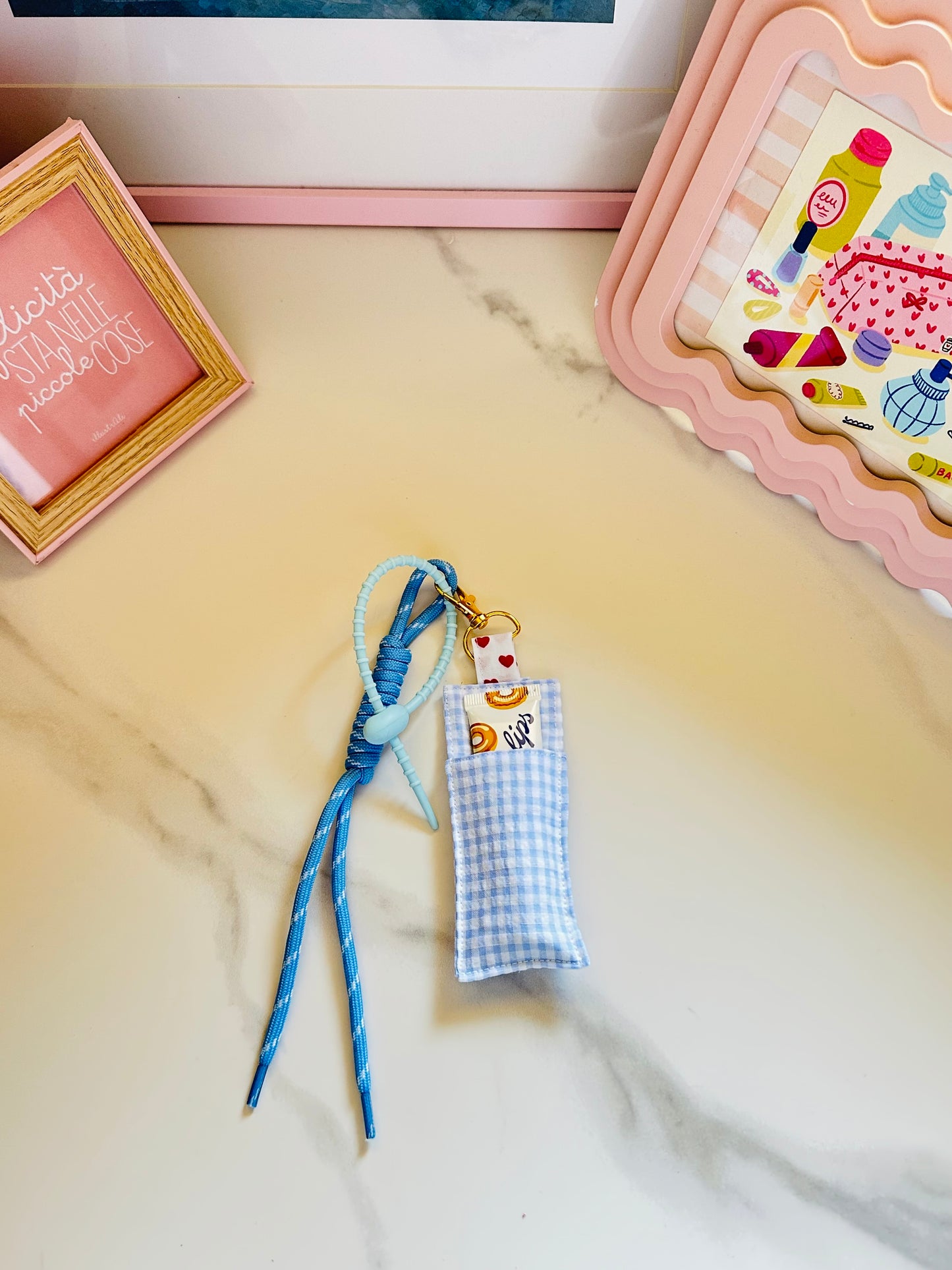Porta lipbalm con charm