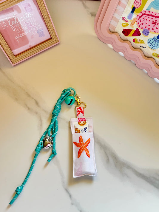 Porta lipbalm con charm