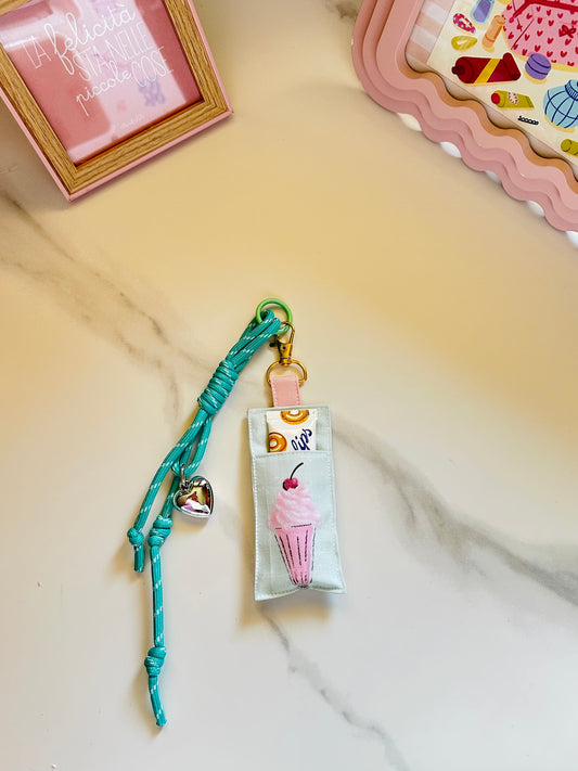 Porta lipbalm con charm