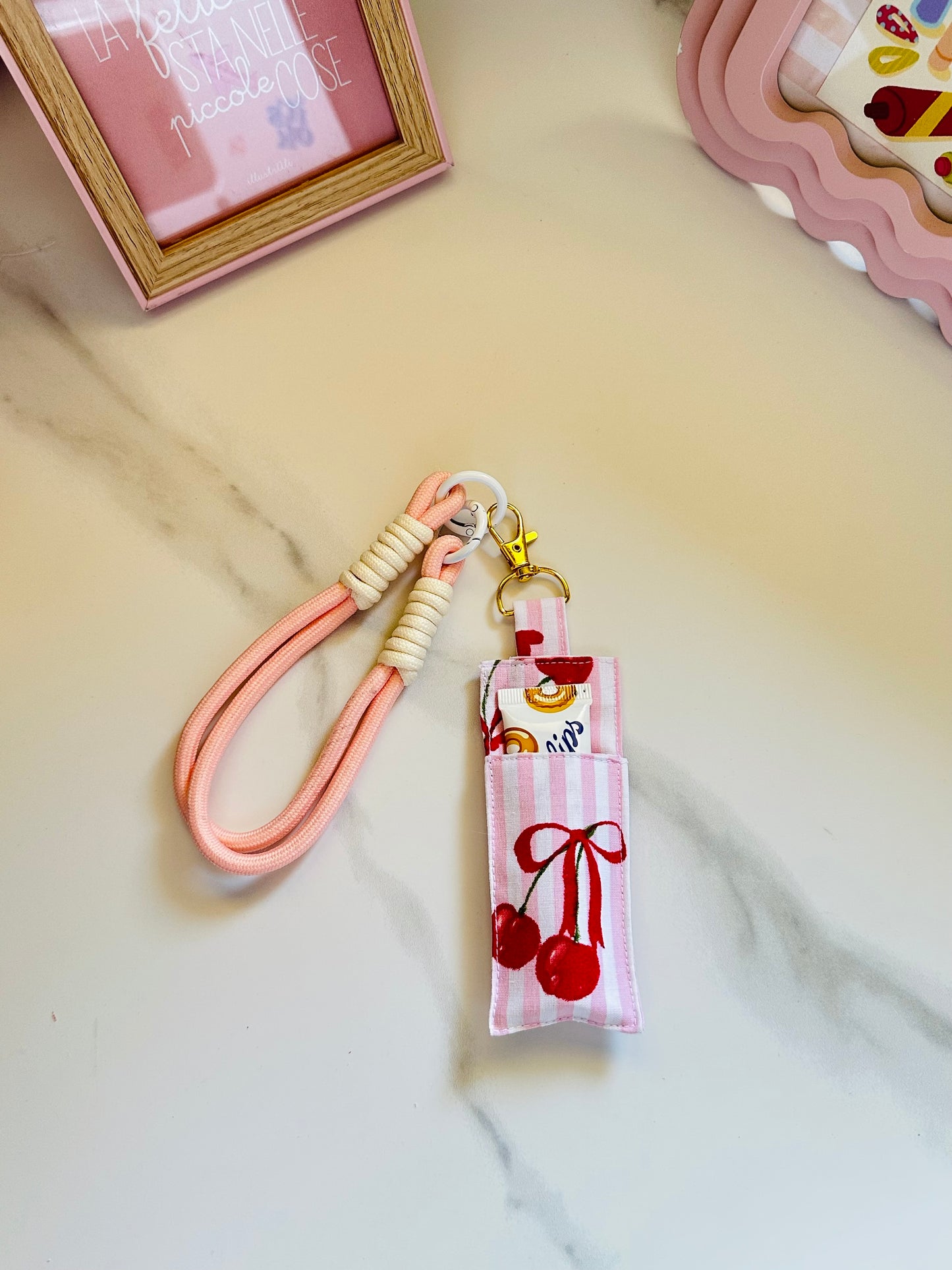 Porta lipbalm con charm