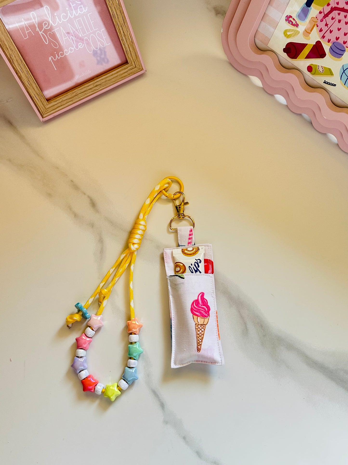 Porta lipbalm con charm